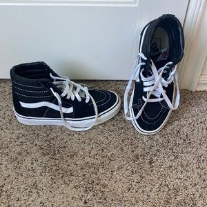 Black high top Vans in a women size 6.